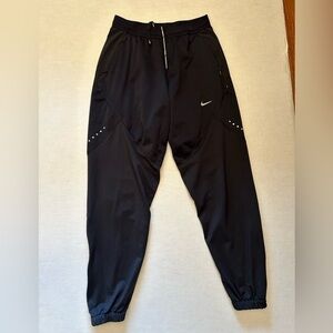 Nike women’s DriFit shield running jogger pants w/zip pockets & ankles Sz-XS X4